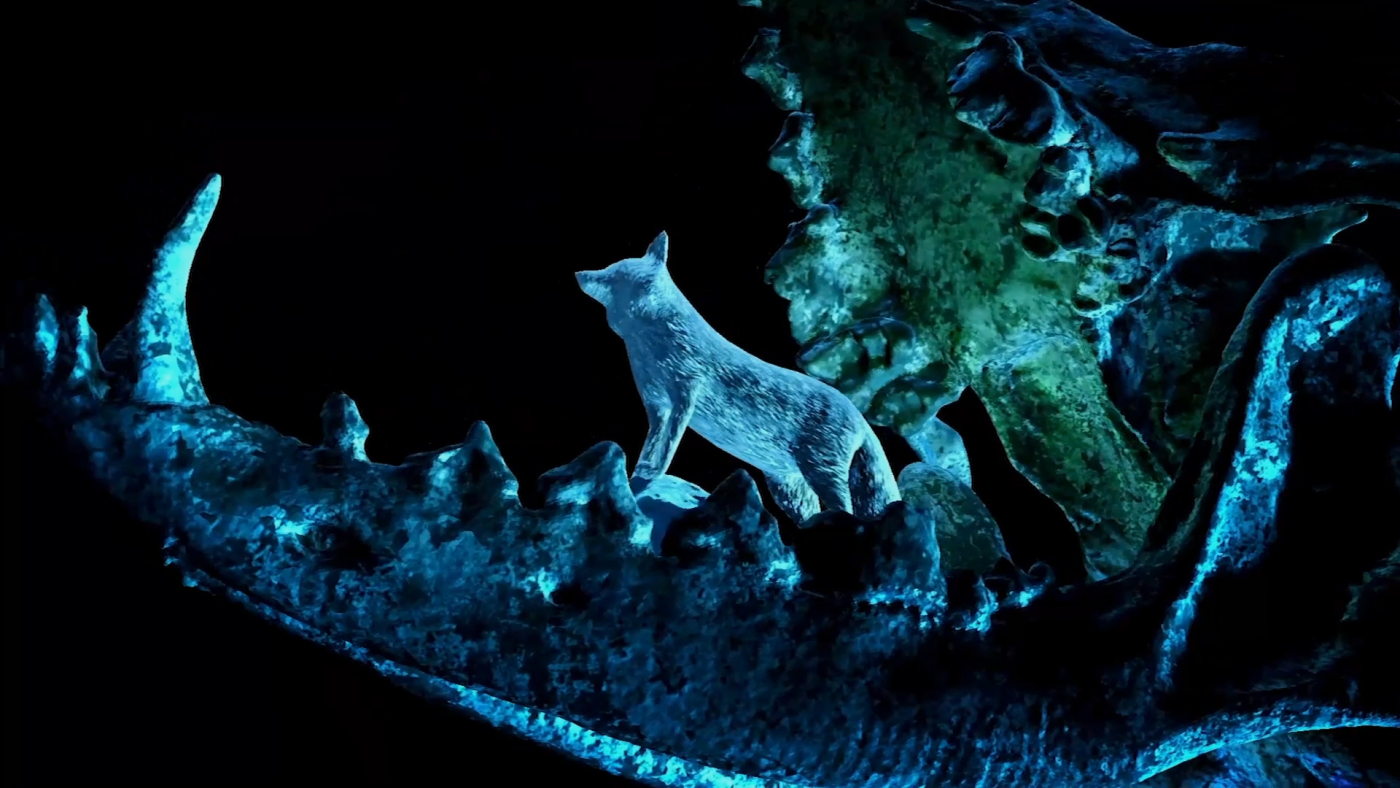 Ice Foxes by Substencia: a luminous blue fox standing in a dark rocky digital landscape
